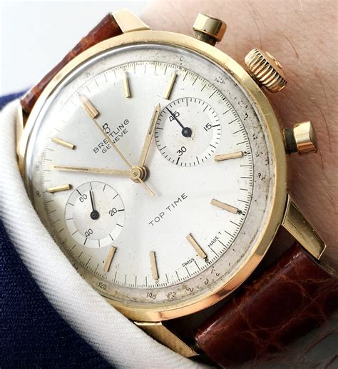 gold breitling watch vintage.